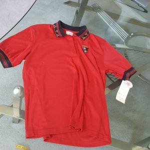 Marcia red golf polo. Cotton/ poly blend. Lg. Nwt